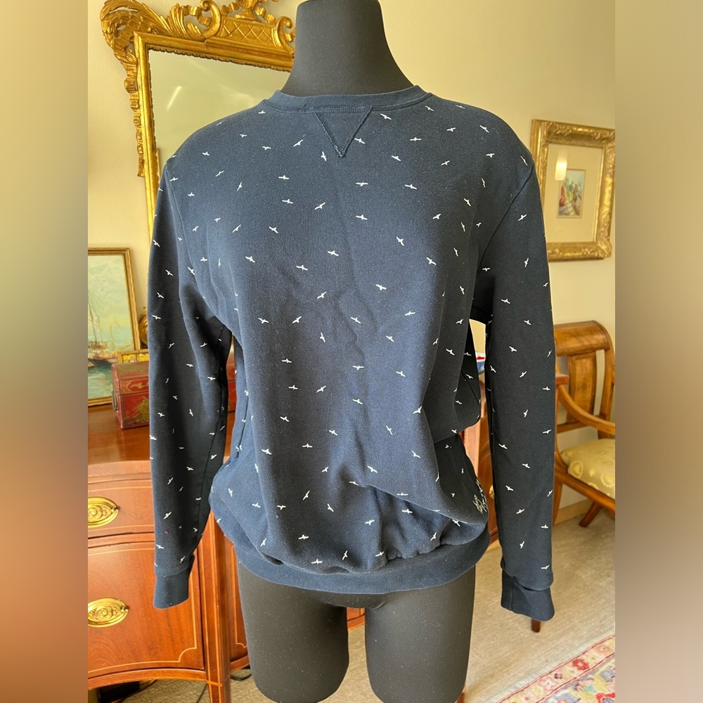 Navy blue sweatshirt with white seagulls. Mens size Medium fitted.